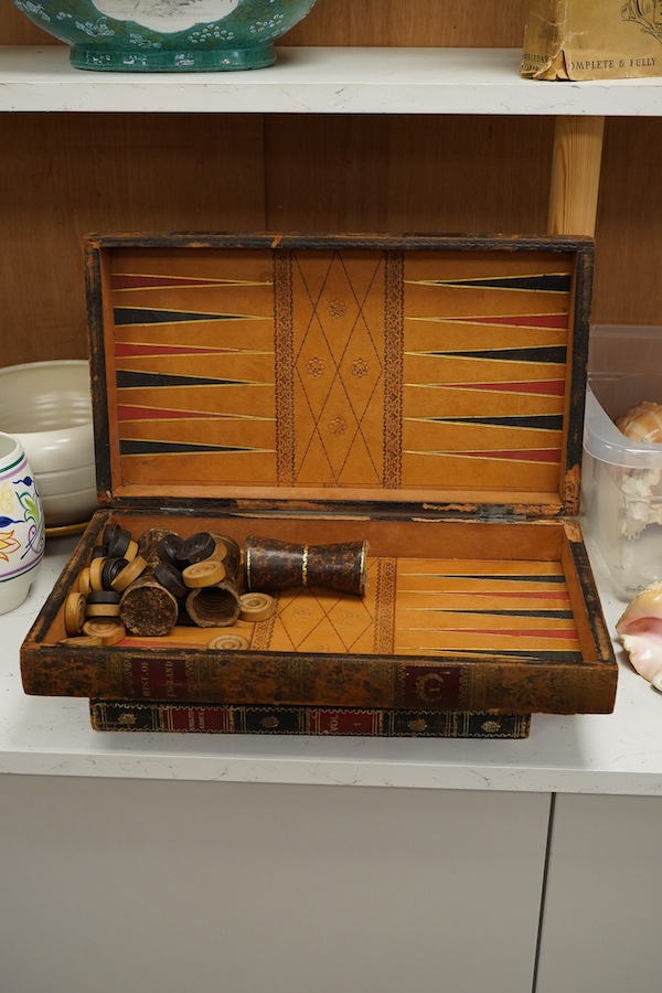 Three late 19th/early 20th century folding chess/backgammon boards fashioned as books